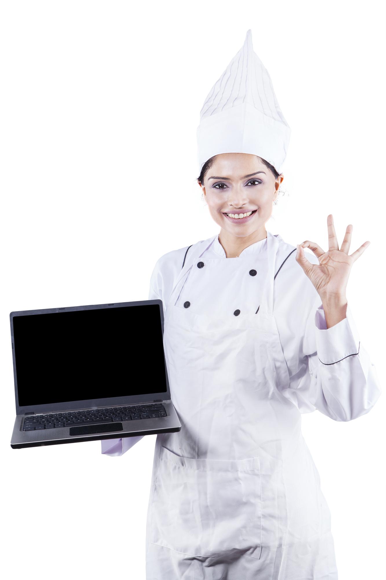 Student and chef smiling after class